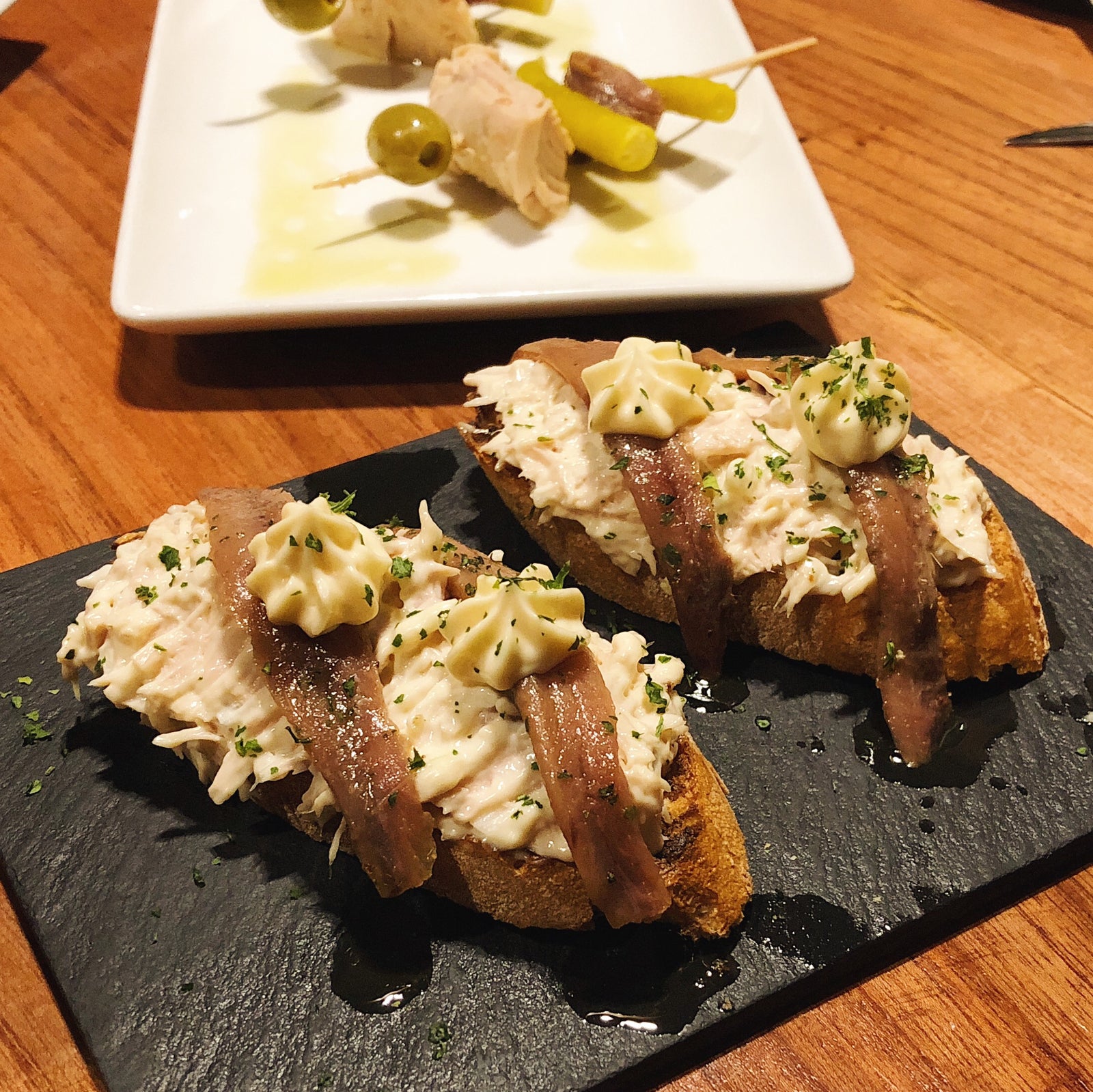 Cantabrian anchovies and Bonito del Norte tuna montaditos