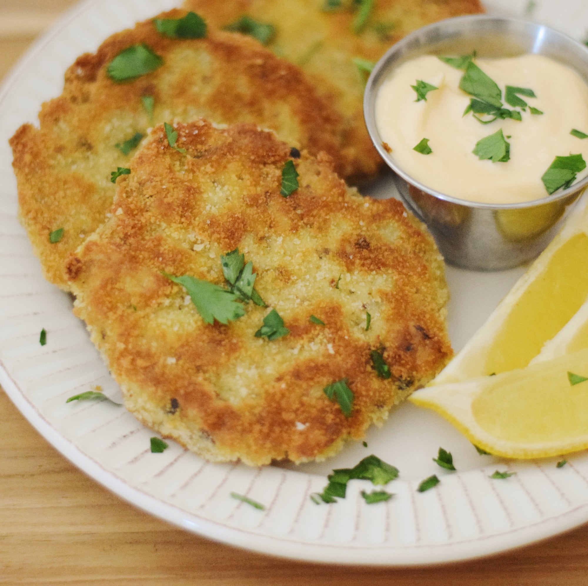 Crispy Sardine Cakes with Escabeche Aioli on a very nice plate - Donostia Foods