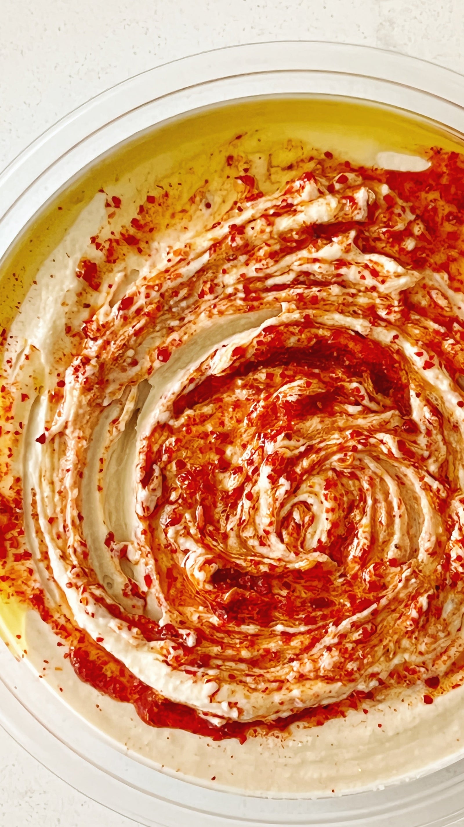 Donostia Foods EVOO and Piment d'Espelette swirled into hummus.