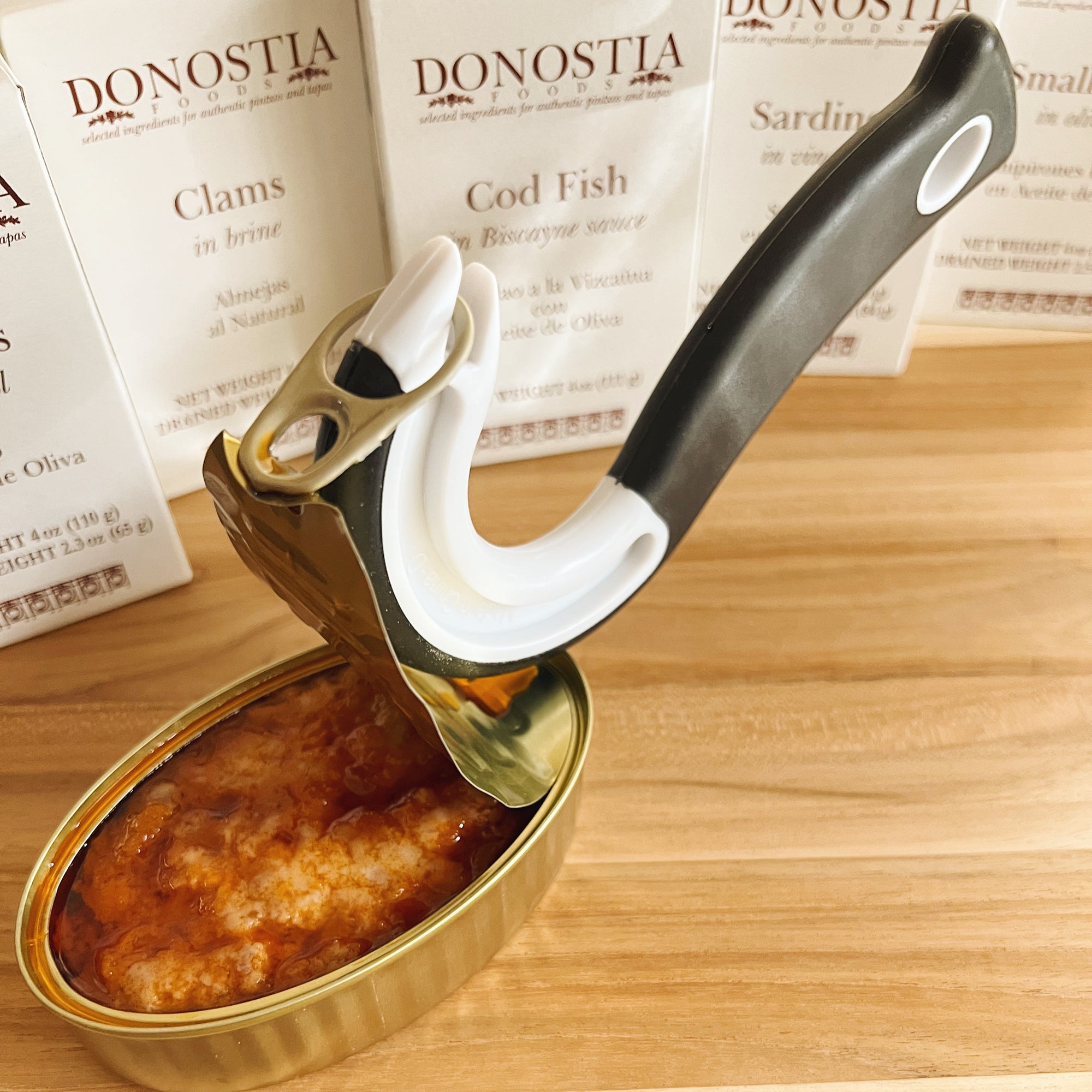 Easy pull can opener opening a tin of Donostia Foods Cod Fish in Biscayne Sauce