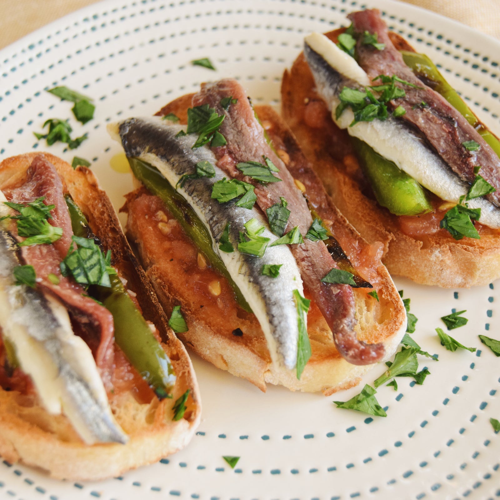 El Matrimonio - montadito pintxo of boqueron and anchoa - white anchovy and dark - Donostia Foods