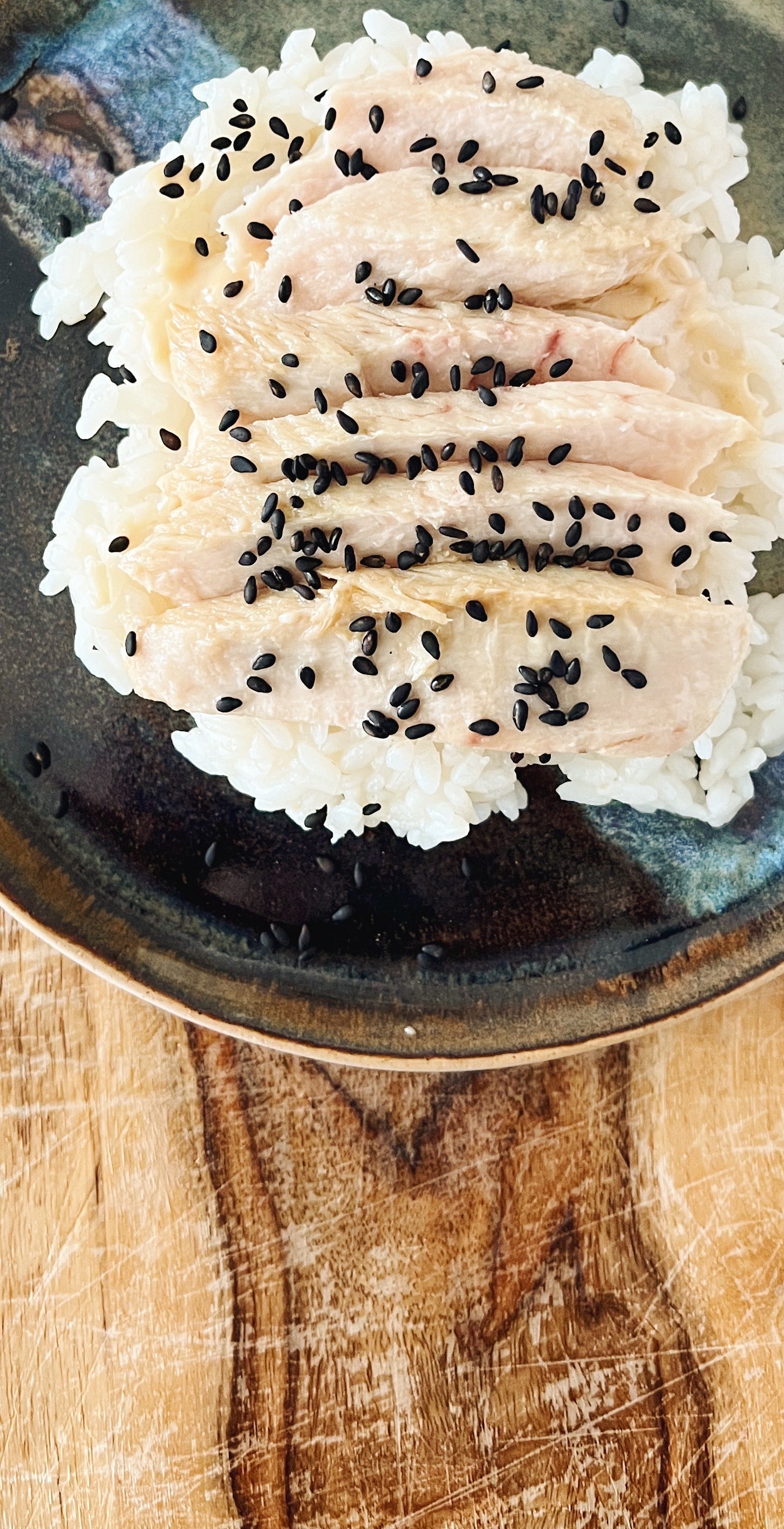 Donostia Foods Tuna Belly Fillets with roasted black sesame seeds on a soy sauce mayo mix with sticky rice.