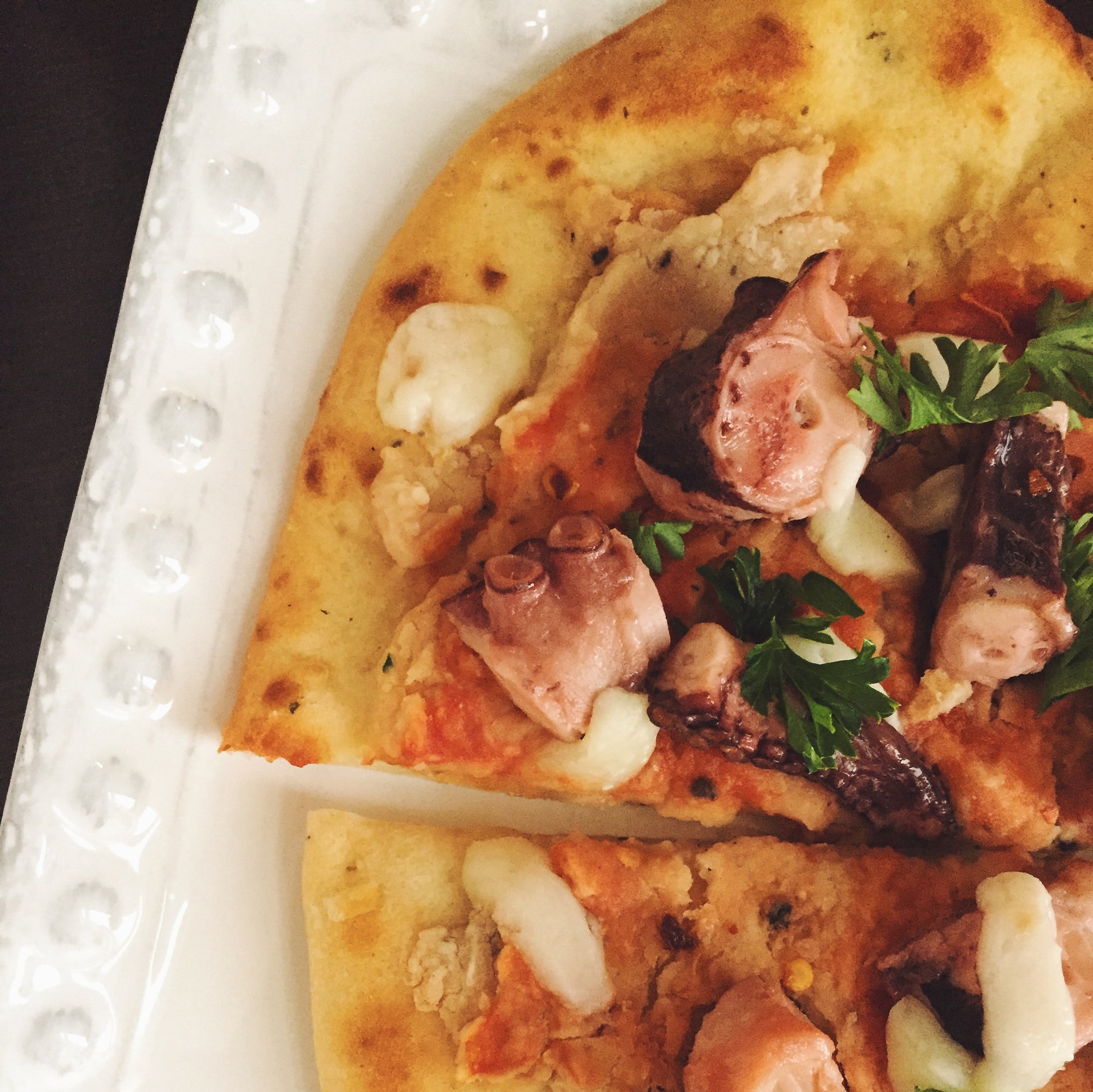 Octopus Coca - Flatbread - with White Bean Puree and Manchego Cheese