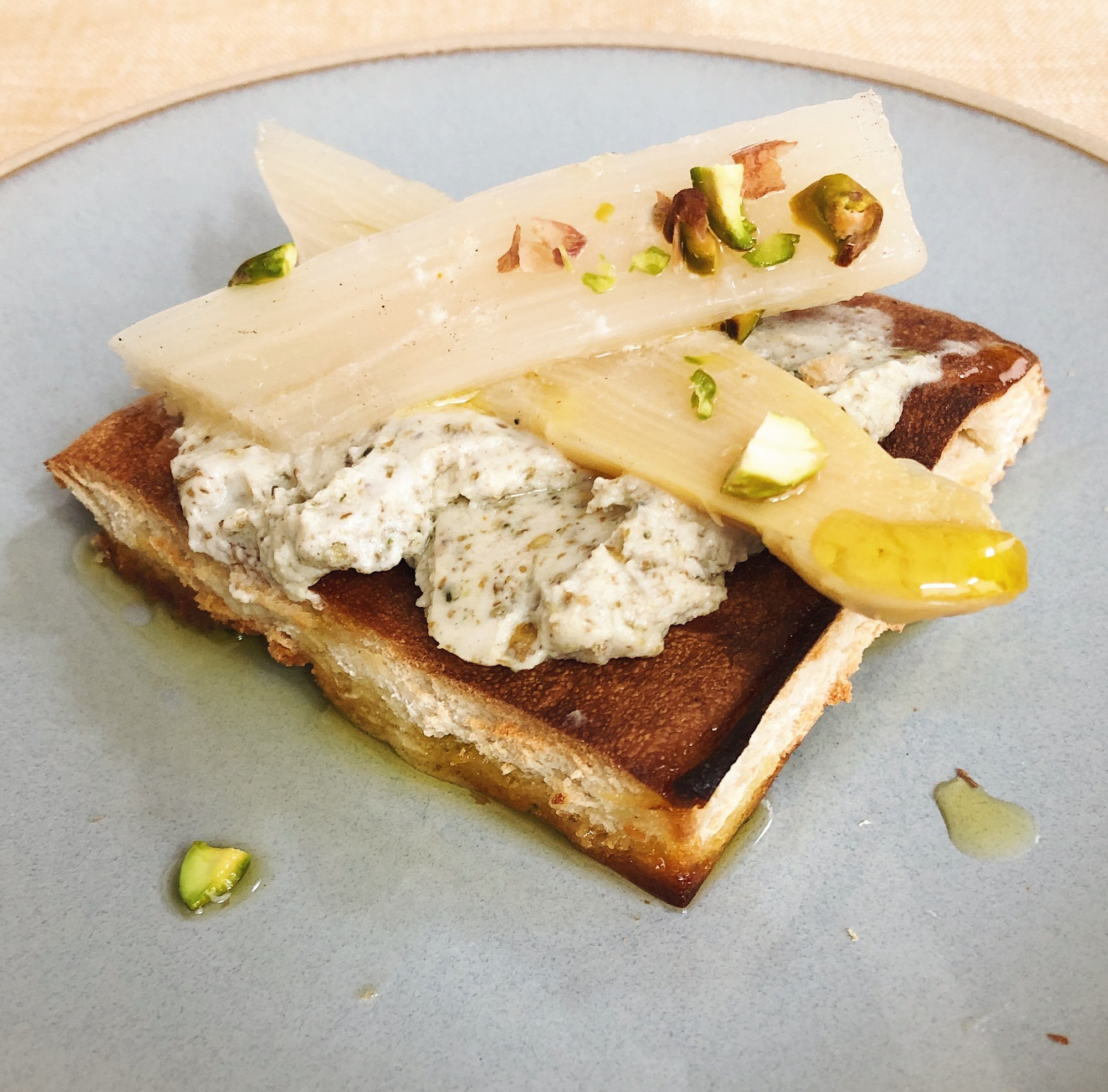 White Asparagus toasted pita with zaatar cream cheese - Donostia Foods