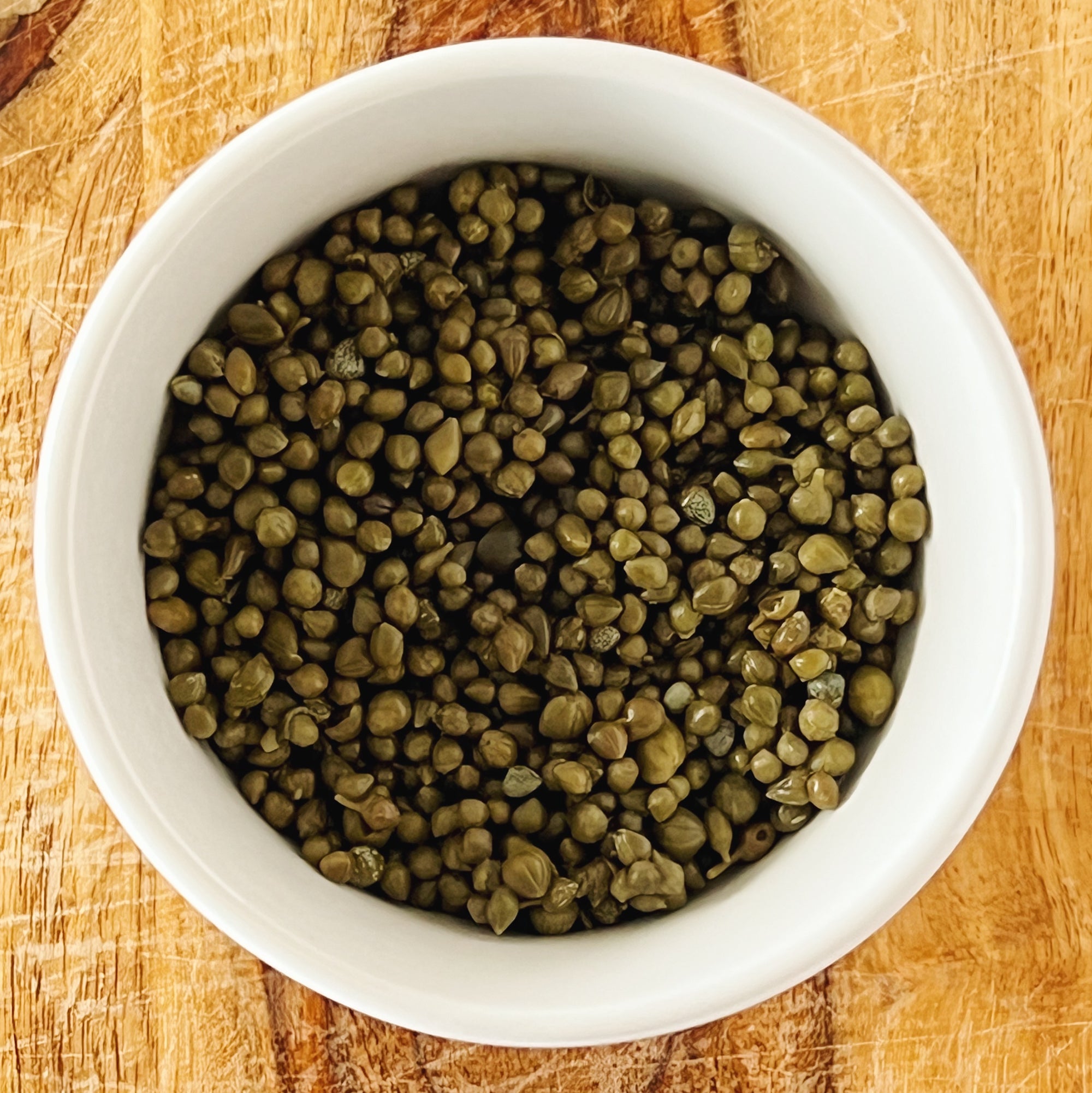 Donostia Foods Lilliput Capers in a properly small bowl.