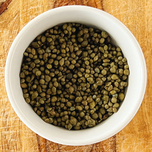 Donostia Foods Lilliput Capers in a properly small bowl.