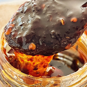 A spoonful of Nam Prik Pao chili jam.