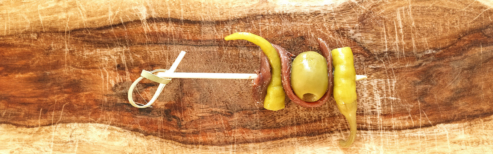 All you need for the Gilda Pintxo from Donostia Foods: Cantabrian anchovy, guindilla pepper, manzanilla olive.
