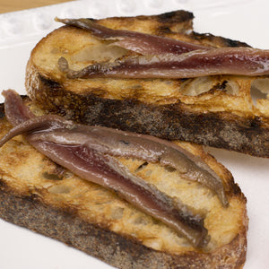 Cantabrian anchovies on grilled toast with olive oil