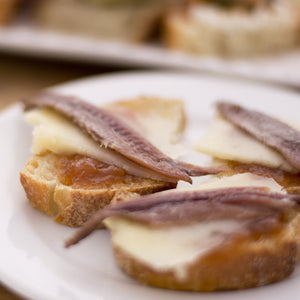 Cantabrian anchovies with manchego cheese and apricot jam