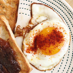 Piment d'Espelette on fried egg cooked in EVOO - Donostia Foods